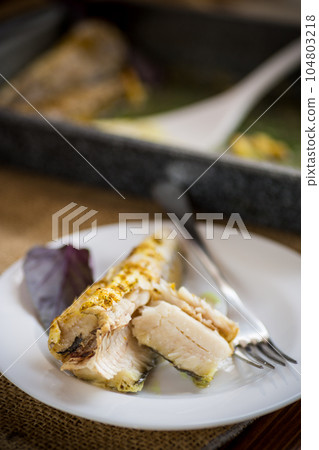 fish baked in the oven with spices, spices fish baked in the oven with spices, spices 104803218