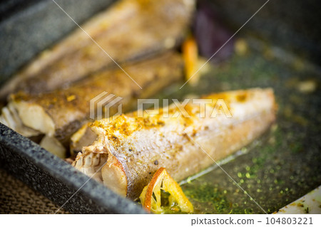 fish baked in the oven with spices, spices fish baked in the oven with spices, spices 104803221