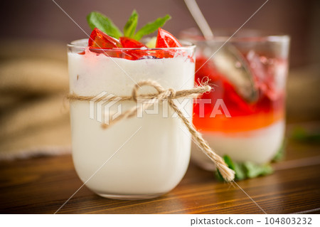 homemade sweet yogurt with fruit jelly pieces homemade sweet yogurt with fruit jelly pieces 104803232