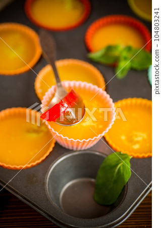 lot of colored sweet fruit jelly in a glass lot of colored sweet fruit jelly in a glass 104803241