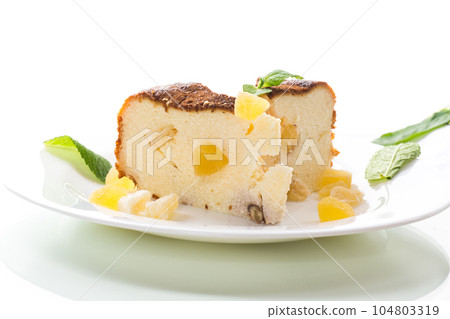 sweet baked cottage cheese casserole with nuts and candied fruits 104803319