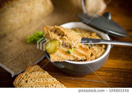 fried buckwheat croutons with cooked homemade pate 104803348