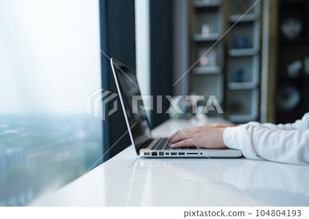 Business man working with laptop. Young business man thinking Concentrated at work. Business man working with laptop. Young business man thinking Concentrated at work. 104804193
