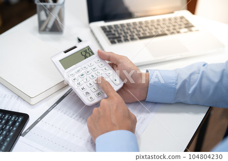 Business woman Accountant investment risk analysis. saving money for Stock market trading with calculator. Accountancy Concept.. 104804230