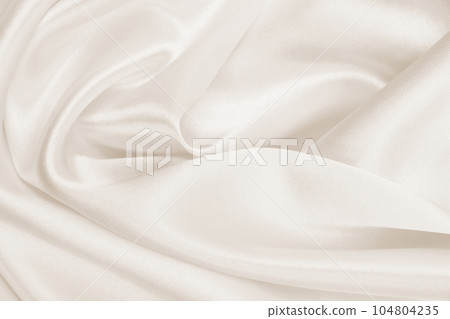 Smooth elegant golden silk or satin luxury cloth texture as wedding background. Luxurious background design. In Sepia toned. Retro style Smooth elegant golden silk or satin luxury cloth texture as wedding background. Luxurious background design. In Sepia toned. Retro style 104804235