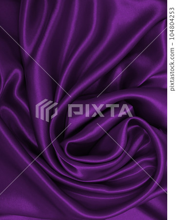Smooth elegant lilac silk or satin luxury cloth texture as abstract background. Luxurious background design 104804253