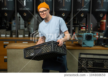 Coffeemaker with coffee packages in cafe, process making and production beverages. Coffeemaker with coffee packages in cafe, process making and production beverages. 104808650