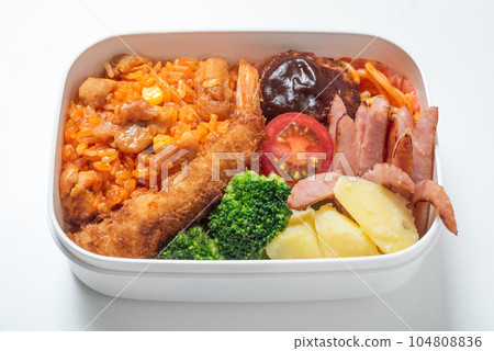 A delicious bento box for children, chicken rice, fried shrimp, hamburger steak, white background 104808836
