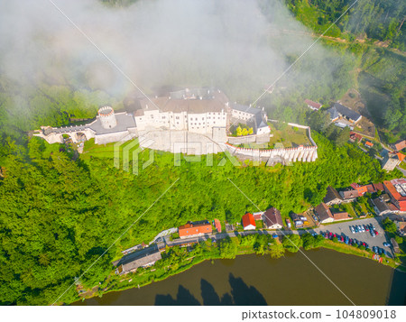 Cesky Sternberk castle and town at Sazava River on sunny summer morning. Aerial view from drone. Cesky Sternberk castle and town at Sazava River on sunny summer morning. Aerial view from drone. 104809018