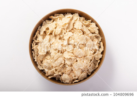 Brown rice flakes 104809696
