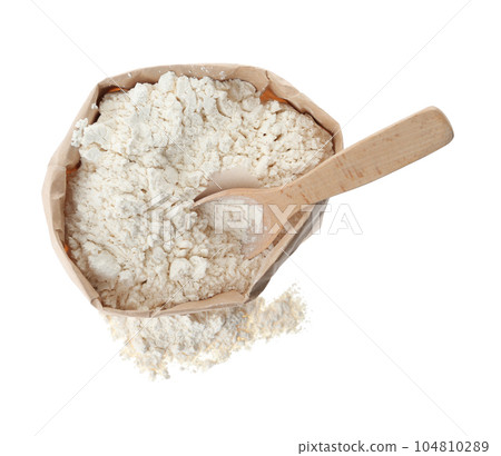 Organic flour and spoon in paper bag isolated on white, top view 104810289