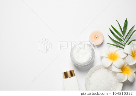 Composition with bath salt on white background, top view. Spa treatment 104810352