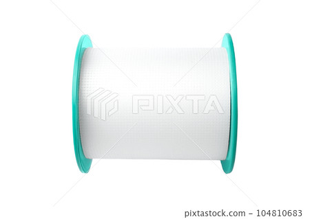 Medical sticking plaster roll isolated on white. First aid item 104810683