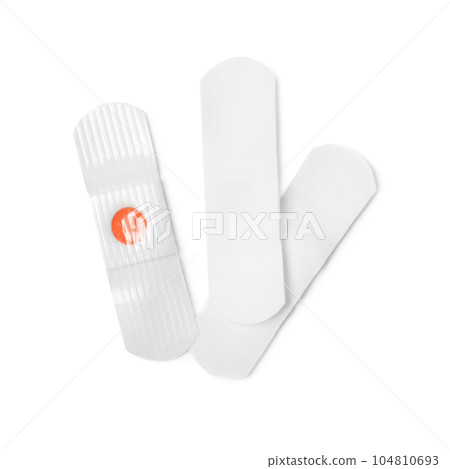 Medical sticking plasters isolated on white. First aid item Medical sticking plasters isolated on white. First aid item 104810693