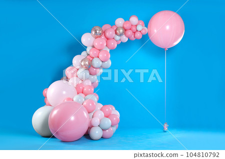 Beautiful composition with balloons on blue background Beautiful composition with balloons on blue background 104810792