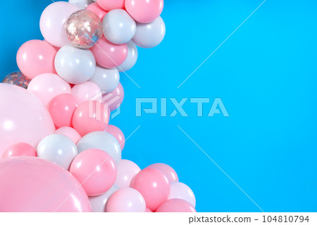 Beautiful composition with balloons on blue background. Space for text 104810794