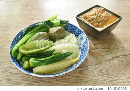 spicy mashed mackerel chili paste sauce eat couple with boiled vegetable on plate spicy mashed mackerel chili paste sauce eat couple with boiled vegetable on plate 104810993