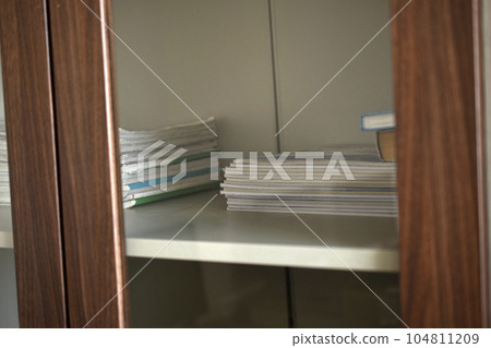 Office furniture. A brown box for documents. The handles are at the old drawer. 104811209