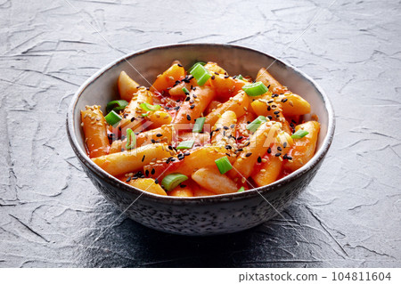 Tteokbokki or topokki, Korean street food, spicy rice cakes Tteokbokki or topokki, Korean street food, spicy rice cakes 104811604
