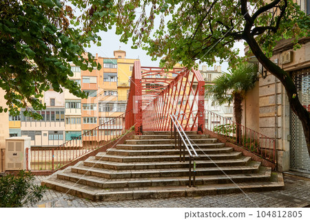 Bridge in Girona, Catalonia, Spain: Eiffel Bridge constructed by Gustave Eiffel over the Onyar River in Girona, Catalonia, Spain. Bridge in Girona, Catalonia, Spain: Eiffel Bridge constructed by Gustave Eiffel over the Onyar River in Girona, Catalonia, Spain. 104812805