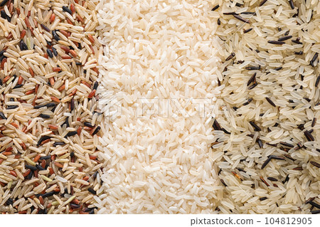 Different types of rice as background, top view 104812905