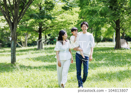 Portrait of a family spending time in the park Portrait of a family spending time in the park 104813807