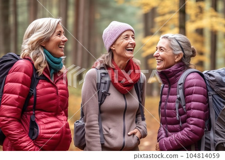 A walk in autumn forest with true friends is the best psychological relief after a noisy and stressful office week. A walk in autumn forest with true friends is the best psychological relief after a noisy and stressful office week. 104814059