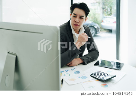 Businessman using computer laptop with planning working on financial document, tax, exchange, accounting and Financial advisor Businessman using computer laptop with planning working on financial document, tax, exchange, accounting and Financial advisor 104814145