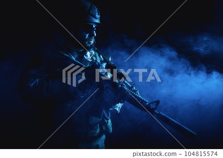 Bearded special forces soldier in the smoke Bearded special forces soldier in the smoke 104815574