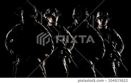 United States Army rangers with assault rifle on dark background 104815622
