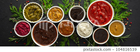 Sauces in bowls with seasonings 104816539