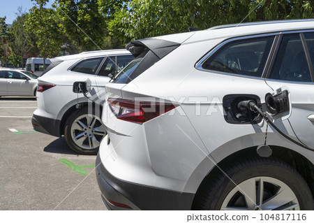 cars being recharged in a parking lot in Koper, Slovenia 104817116
