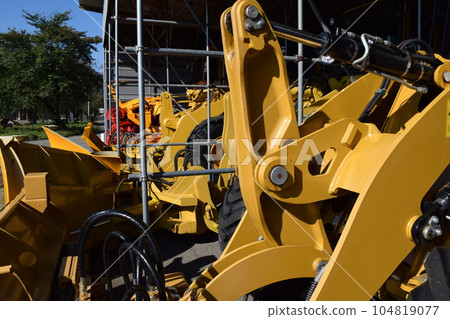 Snowplow waiting in a snowy country 104819077
