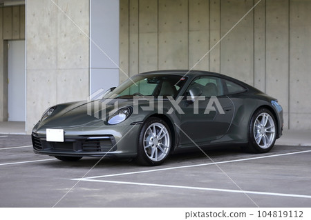 Image of a sports car in a parking lot Image of a sports car in a parking lot 104819112