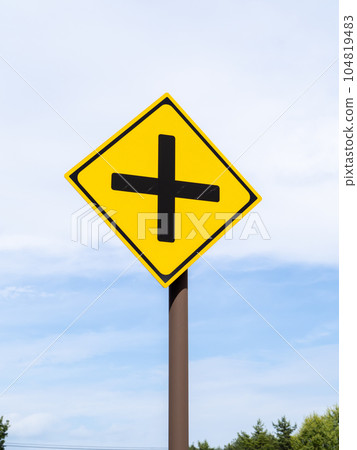Road sign (warning sign) "There is a +-shaped road intersection". (vertical composition) Road sign (warning sign) "There is a +-shaped road intersection". (vertical composition) 104819483