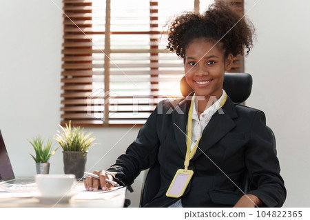 Accountant black woman working on laptop and do document, tax, exchange, accounting and Financial advisor concept 104822365
