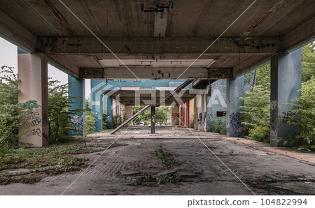 Beside the old metal staircase is in the abandoned buildings and was left to deteriorate over years. Beside the old metal staircase is in the abandoned buildings and was left to deteriorate over years. 104822994