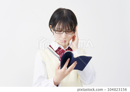 High school girl reading white background High school girl reading white background 104823156