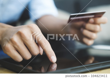 Customer shopping online pay by credit card. Customer shopping online pay by credit card. 104823411