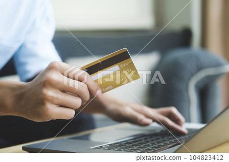 Customer shopping online pay by credit card. Customer shopping online pay by credit card. 104823412