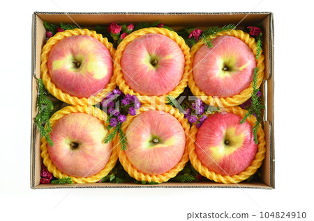 beautiful pink apple in the box on white background beautiful pink apple in the box on white background 104824910