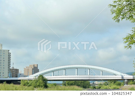 Arch bridge over the Toyohira River in Sapporo Arch bridge over the Toyohira River in Sapporo 104825347