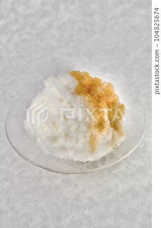 shaved ice in a glass bowl 104825674