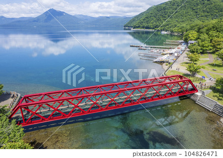 Aerial view of Lake Shikotsu in summer (Yamasen Railway Bridge) Aerial view of Lake Shikotsu in summer (Yamasen Railway Bridge) 104826471