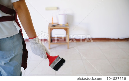 Room Painting Job painter man with roller. 104827336