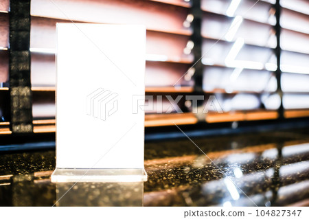 Mock up Menu frame standing on wood table in Bar restaurant cafe. space for text. Menu mack up blank for text marketing promotion Mock up Menu frame standing on wood table in Bar restaurant cafe. space for text. Menu mack up blank for text marketing promotion 104827347