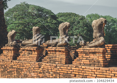 Broken ancient Buddha statue Broken ancient Buddha statue 104829434