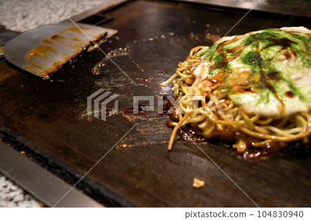 Osaka specialty okonomiyaki 104830940