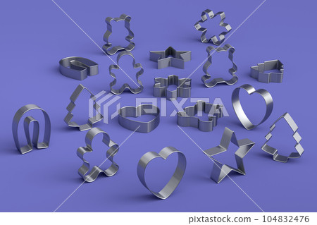 Set of metal cookie cutters for homemade Christmas biscuit on a violet Set of metal cookie cutters for homemade Christmas biscuit on a violet 104832476