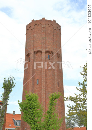 Skagen Water Tower.  Skagen water tower in northern Denmark.  Skagen is a port town on the Jutland peninsula and the brick water tower was constructed in 1934 and was operational until 1983. 104833605